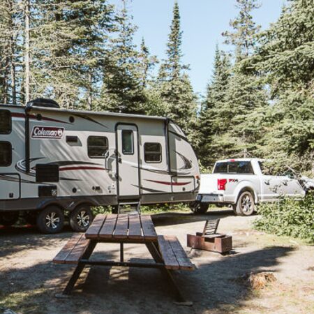 Travel trailer backing into a campsite